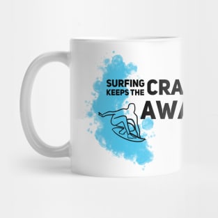 Surfing keeps the crazy away Mug